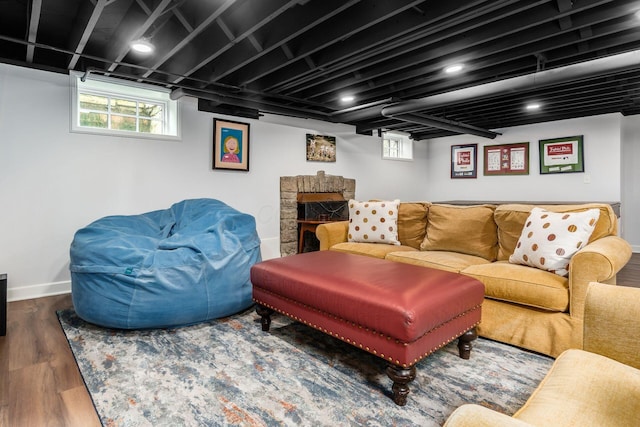 living room with wood finished floors and baseboards