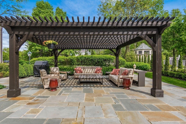 view of patio / terrace with an outdoor living space, area for grilling, and a pergola