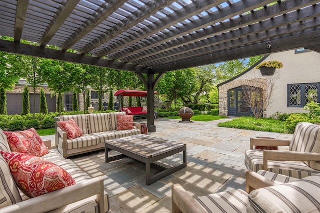view of patio / terrace with an outdoor living space and a pergola