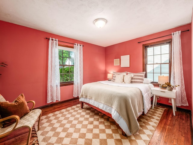 bedroom featuring light wood-style floors