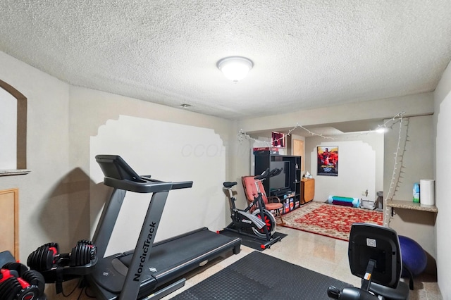 8380 Squad Dr, Galloway, OH 43119 - exercise room with a textured ceiling
