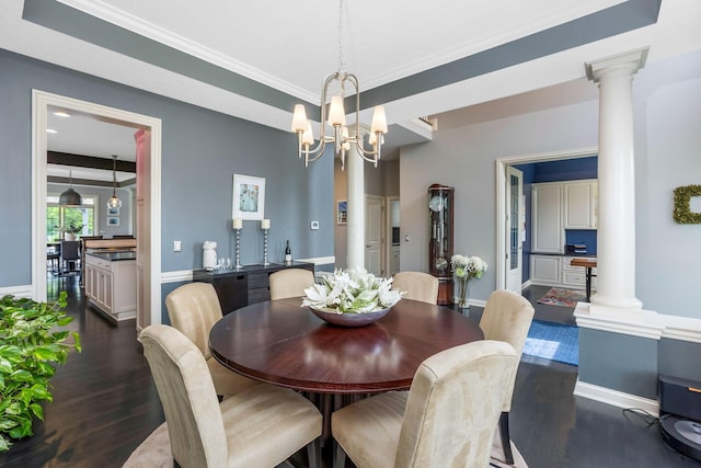 4166 Borge Way, Dublin, OH 43016 - dining space featuring ornate columns, dark wood-style floors, a chandelier, baseboards, and crown molding