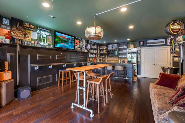 4166 Borge Way, Dublin, OH 43016 - dining room with a community bar, dark wood-style floors, and recessed lighting