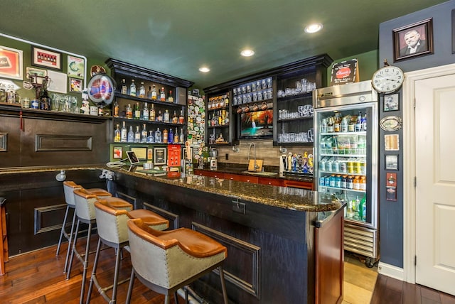 4166 Borge Way, Dublin, OH 43016 - indoor wet bar with wood finished floors, recessed lighting, and wine cooler