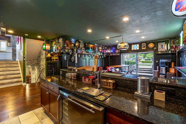 4166 Borge Way, Dublin, OH 43016 - bar with beverage cooler, dishwasher, stairway, recessed lighting, and tile patterned flooring