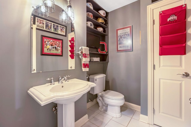 4166 Borge Way, Dublin, OH 43016 - bathroom with baseboards, toilet, and tile patterned flooring