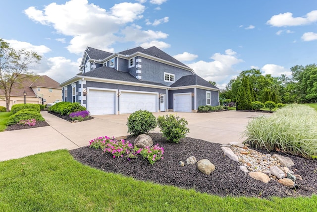 4166 Borge Way, Dublin, OH 43016 - view of front of property with stucco siding, a garage, and concrete driveway