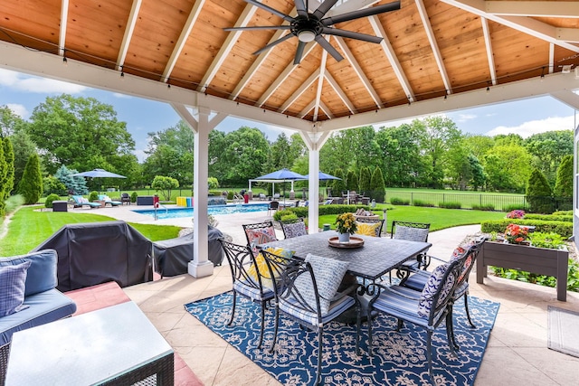 4166 Borge Way, Dublin, OH 43016 - view of patio / terrace with a gazebo, ceiling fan, an outdoor living space, view of scattered trees, and outdoor dining space