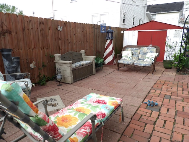 1202 W Mulberry St, Lancaster, OH 43130 - fenced backyard featuring a patio and an outdoor hangout area