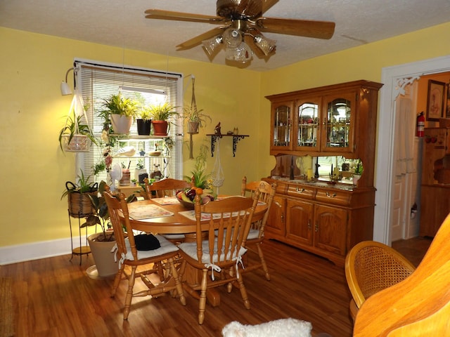 1202 W Mulberry St, Lancaster, OH 43130 - dining area featuring ceiling fan, wood finished floors, baseboards, and a textured ceiling