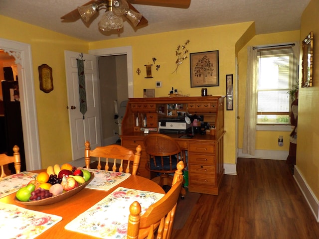 1202 W Mulberry St, Lancaster, OH 43130 - dining area with dark wood-style floors, a ceiling fan, and baseboards