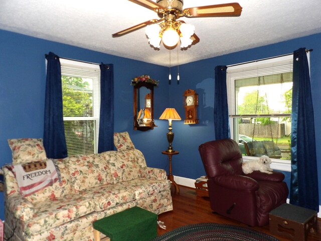 1202 W Mulberry St, Lancaster, OH 43130 - living area with wood finished floors, ceiling fan, baseboards, and a textured ceiling