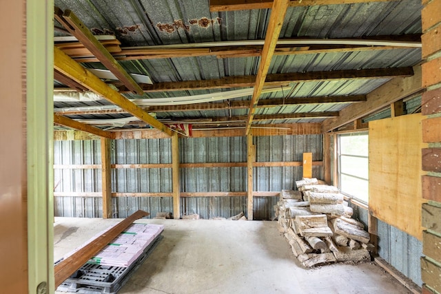 misc room featuring unfinished concrete flooring