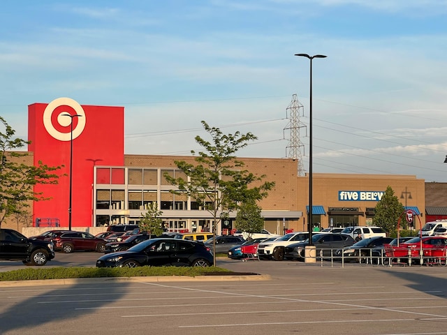 view of commercial property featuring uncovered parking