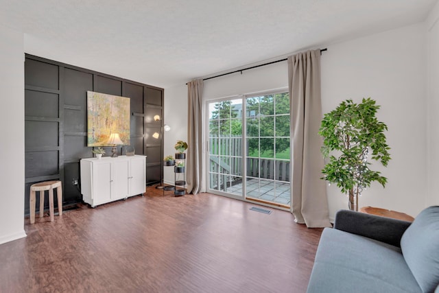living room featuring dark wood finished floors
