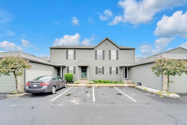 view of front of house featuring uncovered parking