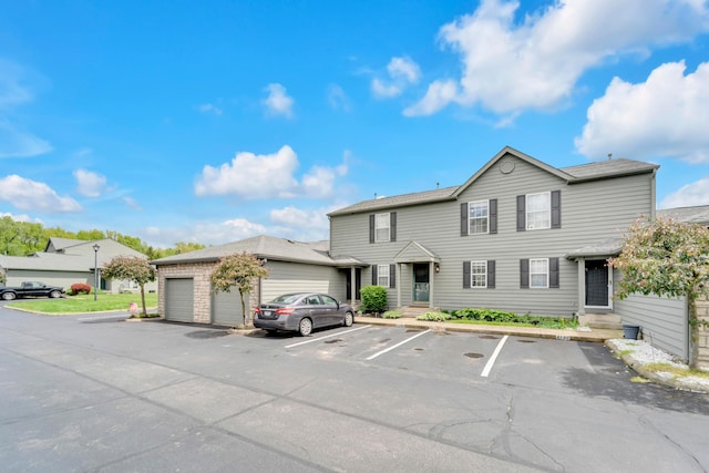 view of front of house featuring uncovered parking