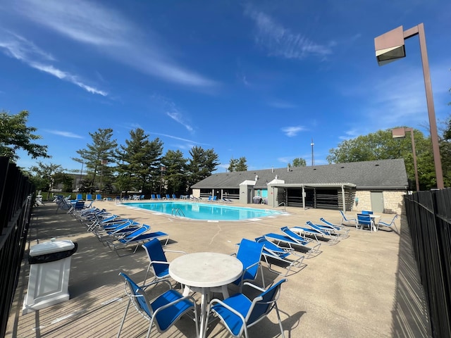 4102 Blendon Way Dr, Columbus, OH 43230 - community pool featuring a patio area