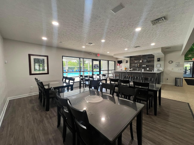 4102 Blendon Way Dr, Columbus, OH 43230 - dining area featuring recessed lighting, a textured ceiling, and wood finished floors