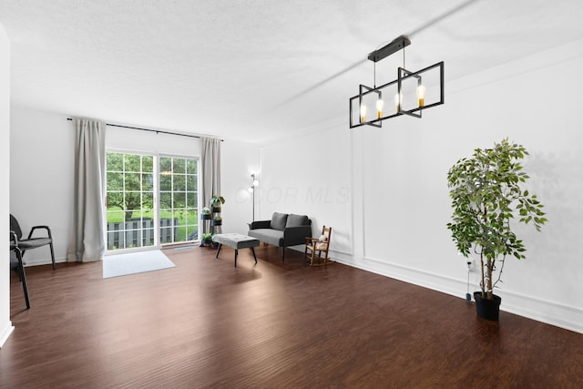 4102 Blendon Way Dr, Columbus, OH 43230 - living area with dark wood-style flooring and baseboards