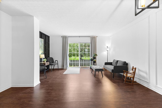4102 Blendon Way Dr, Columbus, OH 43230 - sitting room with dark wood-style flooring and baseboards