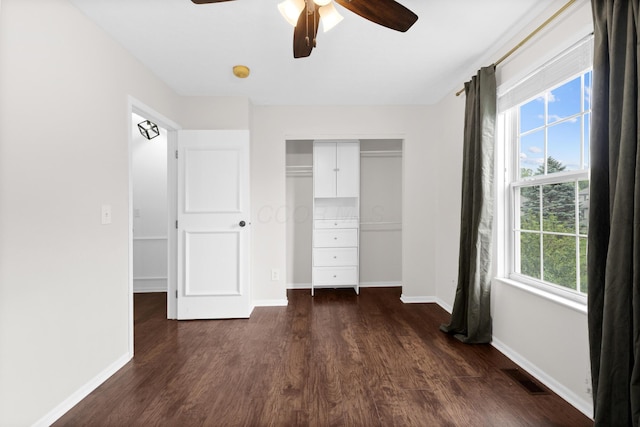 4102 Blendon Way Dr, Columbus, OH 43230 - unfurnished bedroom featuring dark wood-style flooring, a closet, and a ceiling fan