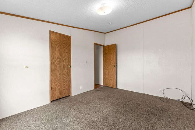 8164 Atlantic St, Caledonia, OH 43314 - carpeted empty room featuring crown molding and a textured ceiling