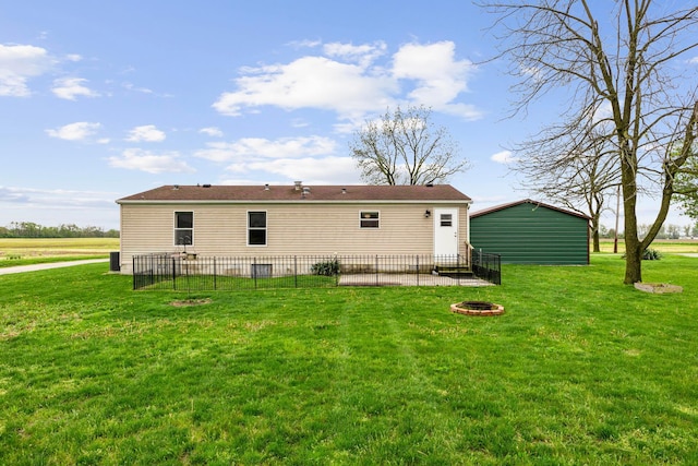 8164 Atlantic St, Caledonia, OH 43314 - back of house featuring a fire pit