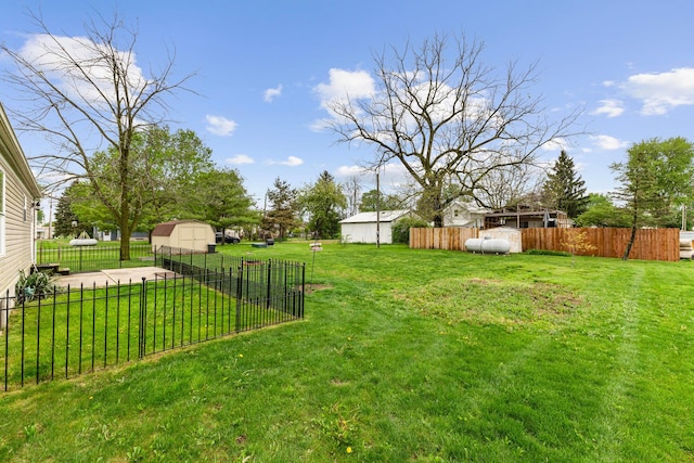 8164 Atlantic St, Caledonia, OH 43314 - view of yard with a storage unit and an outbuilding