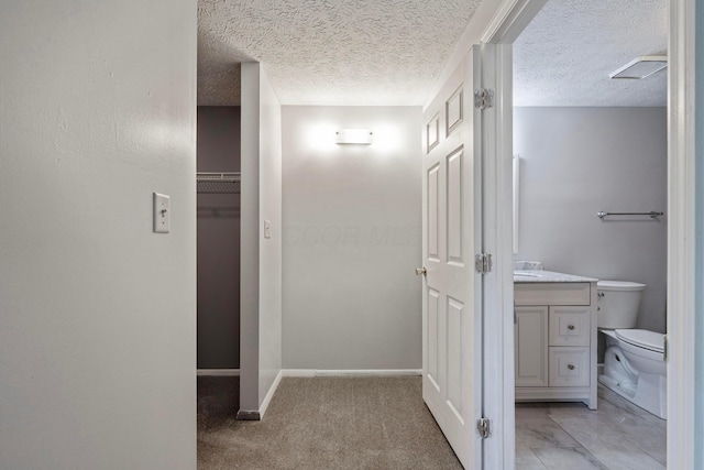 3860 Julia Ct, Columbus, OH 43230 - corridor with a textured ceiling, baseboards, and light carpet