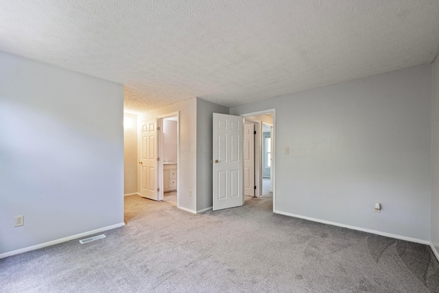 3860 Julia Ct, Columbus, OH 43230 - empty room with carpet floors, baseboards, and a textured ceiling