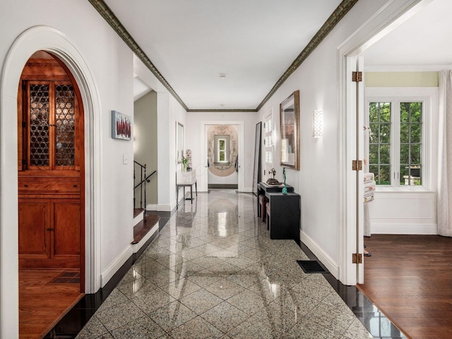 10 Park Dr, Columbus, OH 43209 - hall featuring granite tiled floors, baseboards, crown molding, and stairway