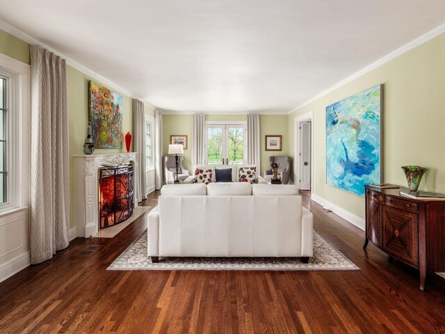 10 Park Dr, Columbus, OH 43209 - living area featuring wood finished floors, a premium fireplace, baseboards, and ornamental molding