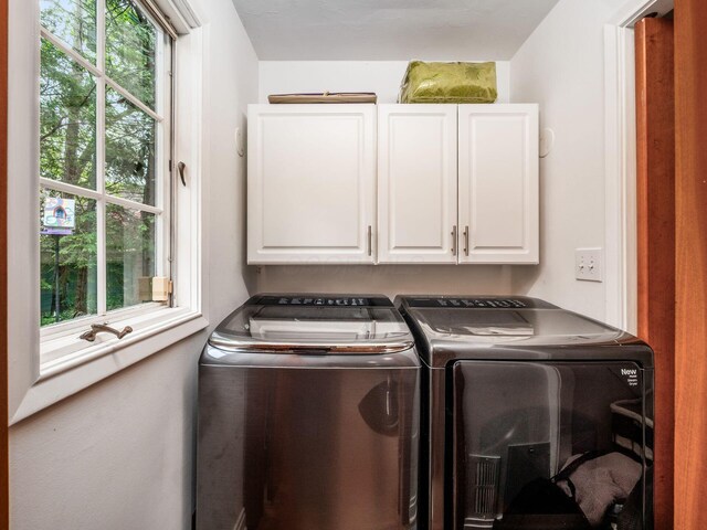 10 Park Dr, Columbus, OH 43209 - laundry room featuring cabinet space and washing machine and clothes dryer