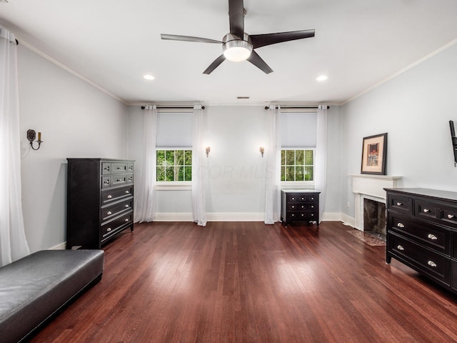 10 Park Dr, Columbus, OH 43209 - living area featuring a ceiling fan, wood finished floors, healthy amount of natural light, baseboards, and ornamental molding