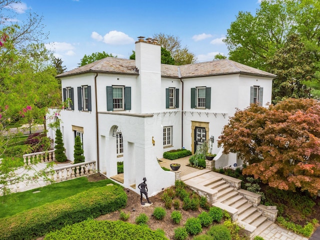 10 Park Dr, Columbus, OH 43209 - view of front of home with a chimney and stucco siding