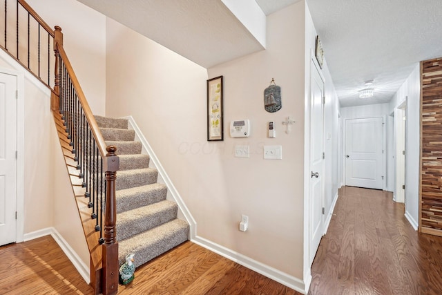 1753 Chestnut Farms Loop, Grove City, OH 43123 - stairs featuring wood finished floors and baseboards
