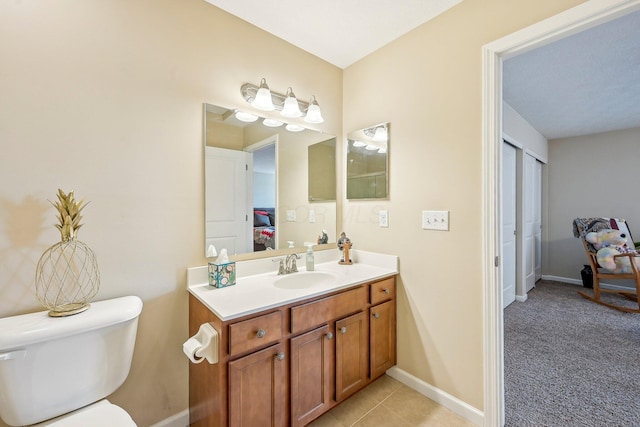 1753 Chestnut Farms Loop, Grove City, OH 43123 - bathroom featuring vanity, baseboards, toilet, and tile patterned floors