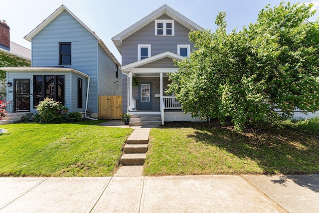 549 Hanford St, Columbus, OH 43206 - american foursquare style home featuring a porch