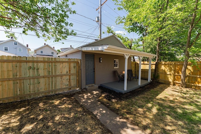 549 Hanford St, Columbus, OH 43206 - rear view of property with a fenced backyard and a patio area