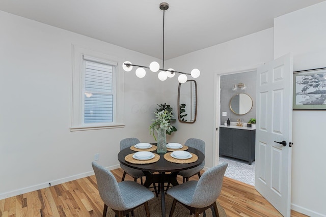 549 Hanford St, Columbus, OH 43206 - dining area featuring light wood-style floors and baseboards