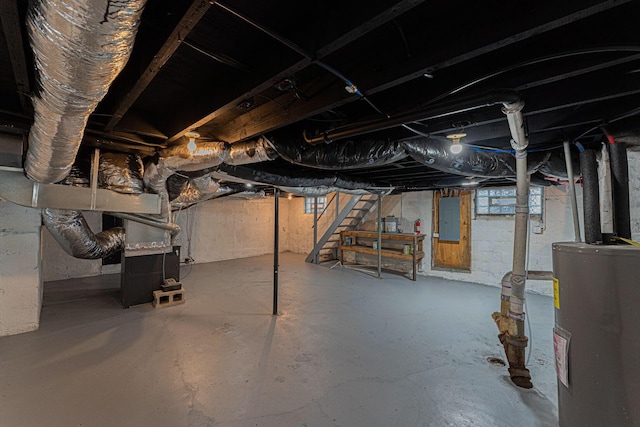 549 Hanford St, Columbus, OH 43206 - below grade area featuring electric panel, water heater, stairway, and heating unit