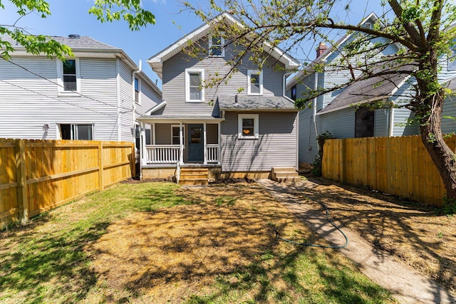 549 Hanford St, Columbus, OH 43206 - rear view of house featuring a fenced backyard and a porch