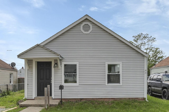 view of front of home with fence