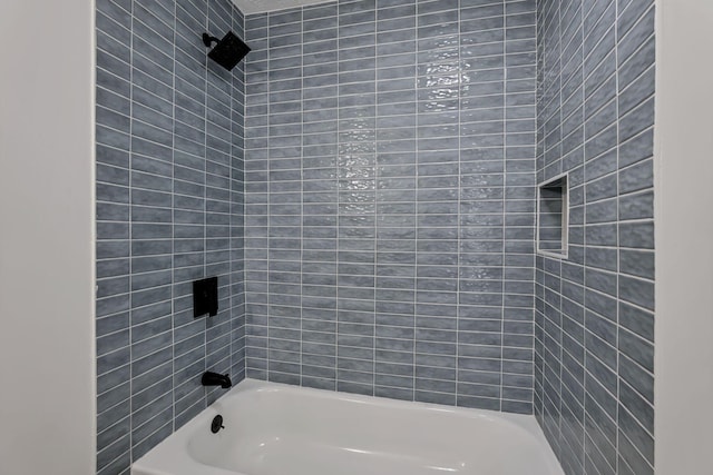 bathroom with shower / bathtub combination