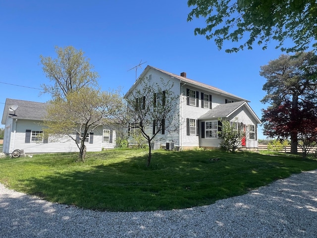 4638 US Highway 42, Cardington, OH 43315 - view of side of property with central AC, a chimney, and a lawn