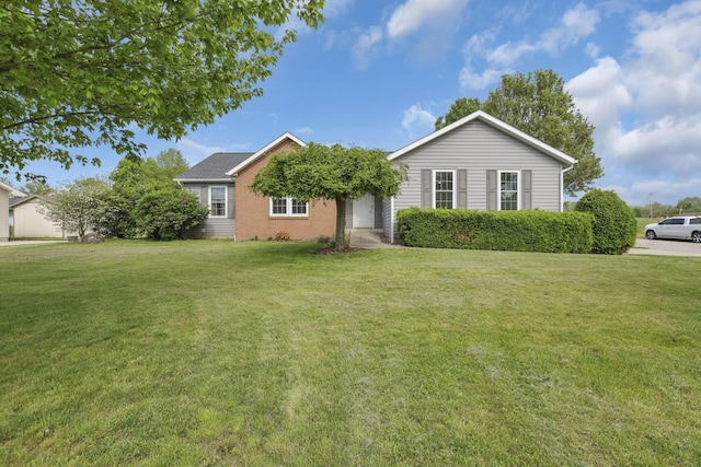 11708 Broad St, Millersport, OH 43046 - view of front of property featuring a front lawn and brick siding