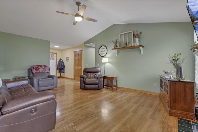 11708 Broad St, Millersport, OH 43046 - living room featuring ceiling fan, lofted ceiling, light wood-style flooring, and baseboards