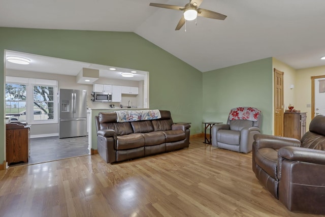 11708 Broad St, Millersport, OH 43046 - living area featuring ceiling fan, light wood finished floors, and lofted ceiling