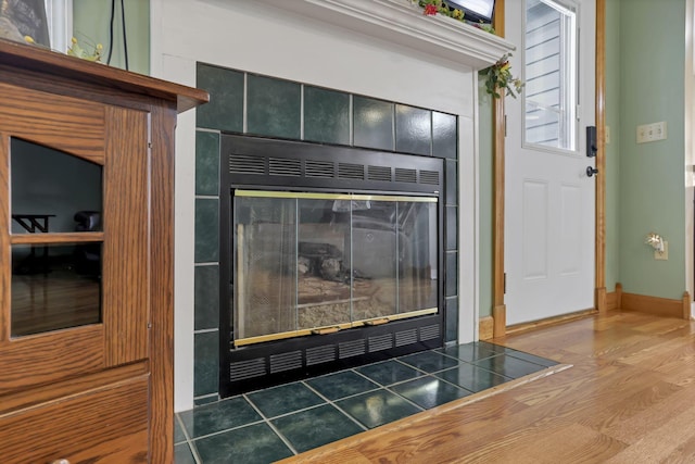 11708 Broad St, Millersport, OH 43046 - detailed view of a tile fireplace and baseboards